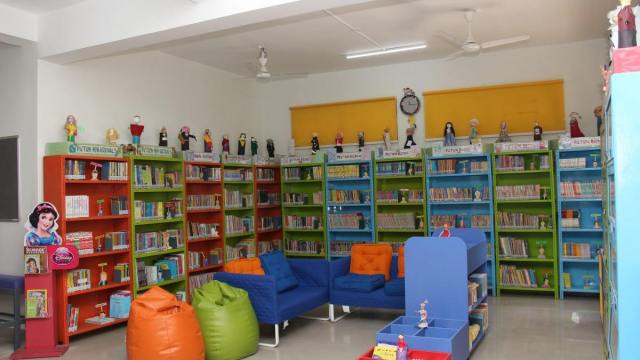CHIREC School library transformed with bean bags, sofas, and a cozy amphitheater, enhancing the joy of reading for students.