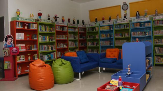 CHIREC School library transformed with bean bags, sofas, and a cozy amphitheater, enhancing the joy of reading for students.