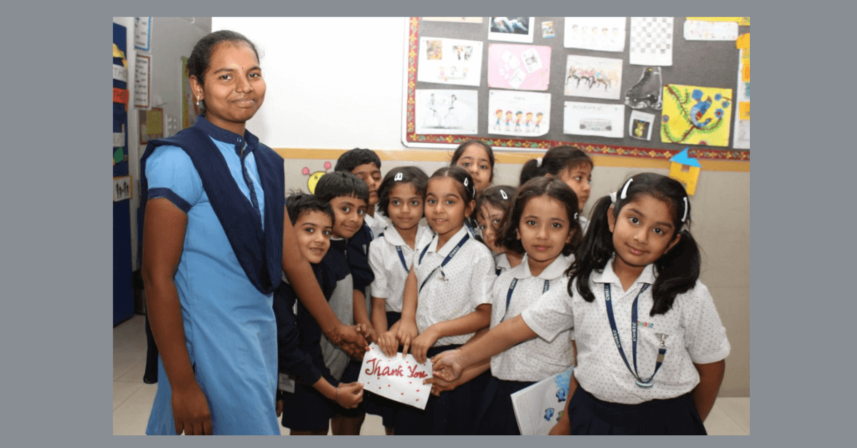 Learning to be humans CHIREC students expressing gratitude with a 'Thank You' card to the helping staff.