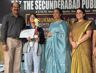 CHIREC Stage VII student Prisha B. receives First Position in the Junior Girls chess tournament.