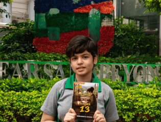 CHIREC Grade VIII student Udbhashita G. with her published book Summer of 13.